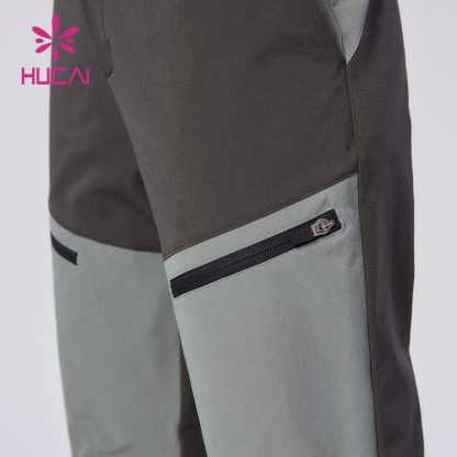 Custom Sports Joggers Quick-drying Teal Zipper Climbing Pants Factory - Image 3