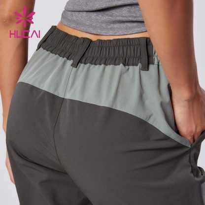 Custom Sports Joggers Quick-drying Teal Zipper Climbing Pants Factory - Image 4